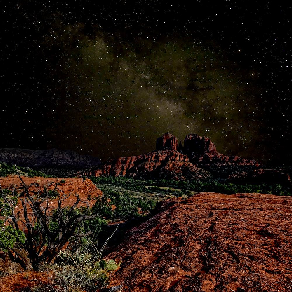 A composite image of Cathedral Rock in Sedona AZ under the starlight of the Milky Way.