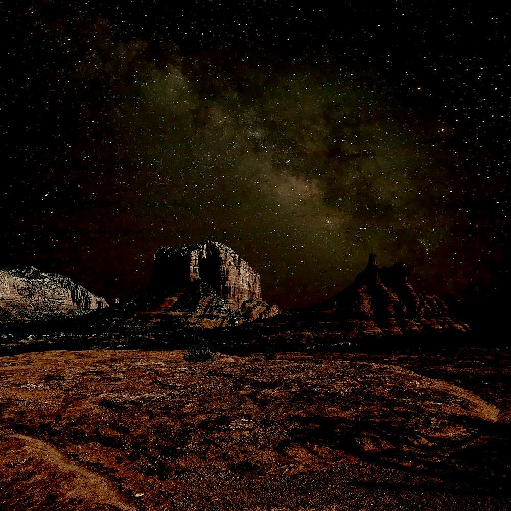 HDR composite of Bell Rock and Courthouse Butte under the Milky Way night Sky. Located in Sedona.