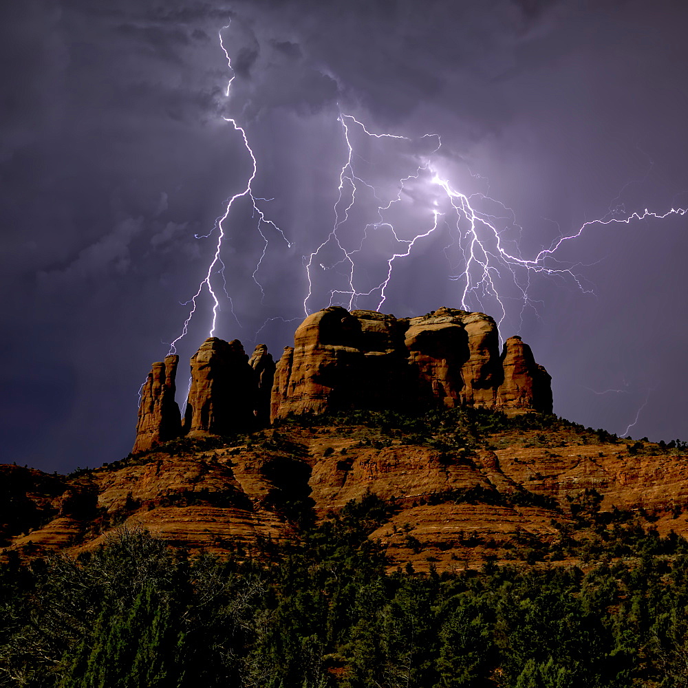 Composite photo of lightning striking southwest of Cathedral Rock in Sedona, Arizona, United States of America, North America