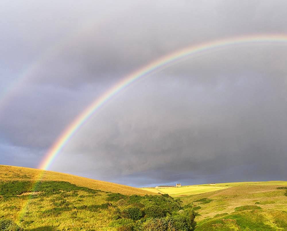 Double rainbow over meadow landscape, near Pennan, Aberdeenshire, Scotland, Great Britain