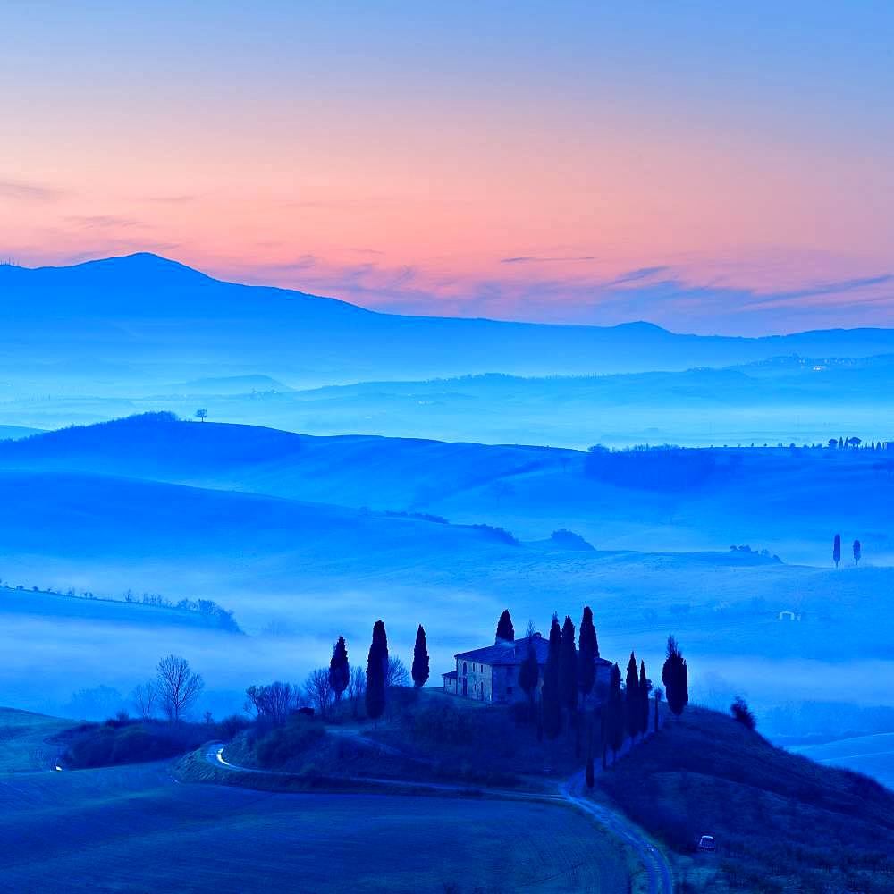 Morning atmosphere in Tuscany, hilly landscape with fog at dawn, Country house Belvedere, Val d'Orcia, Tuscany, Italy, Europe