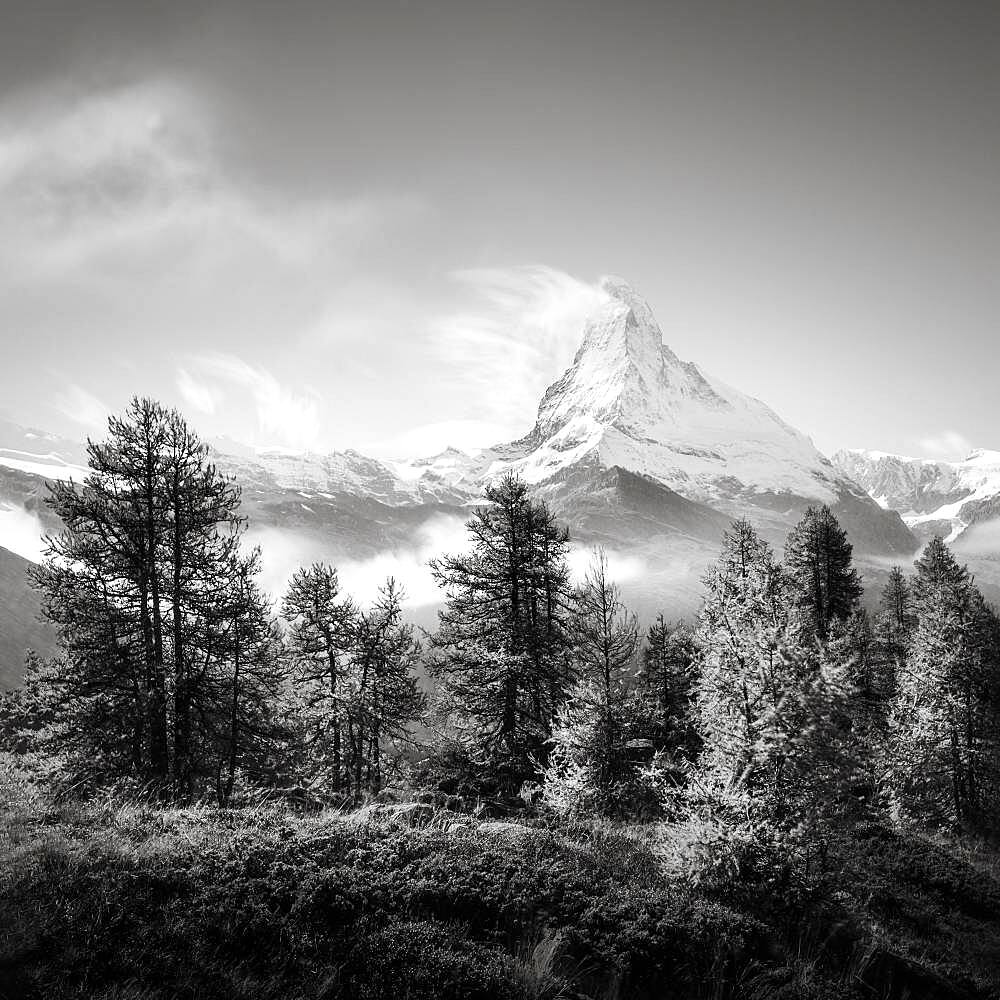 Clouds over the Swiss Matterhorn in black and white, Zermatt, Switzerland, Europe