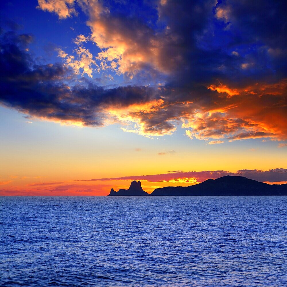 Ibiza island sunset with Es Vedra in background at Balearic islands