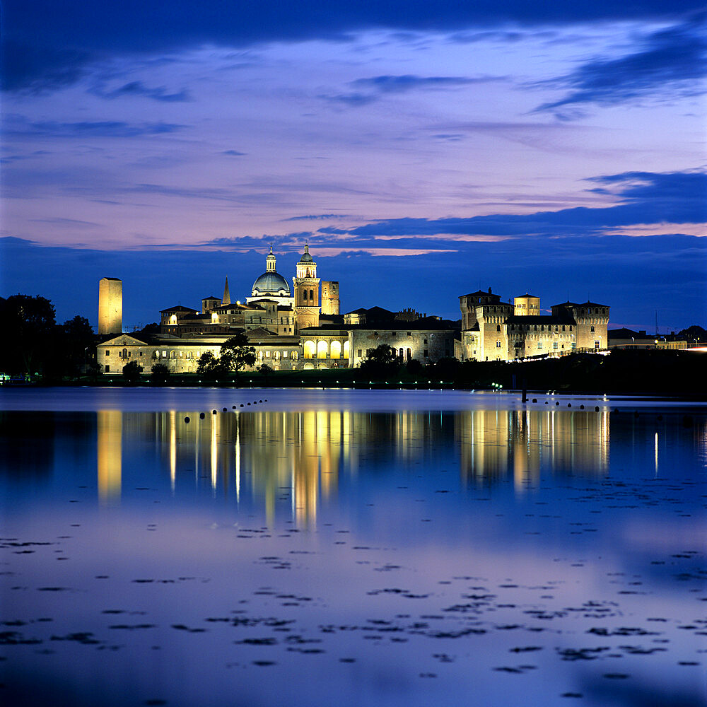 Dusk over the old town and Lake Inferiore, Mantua, Lombardy, Italy, Europe