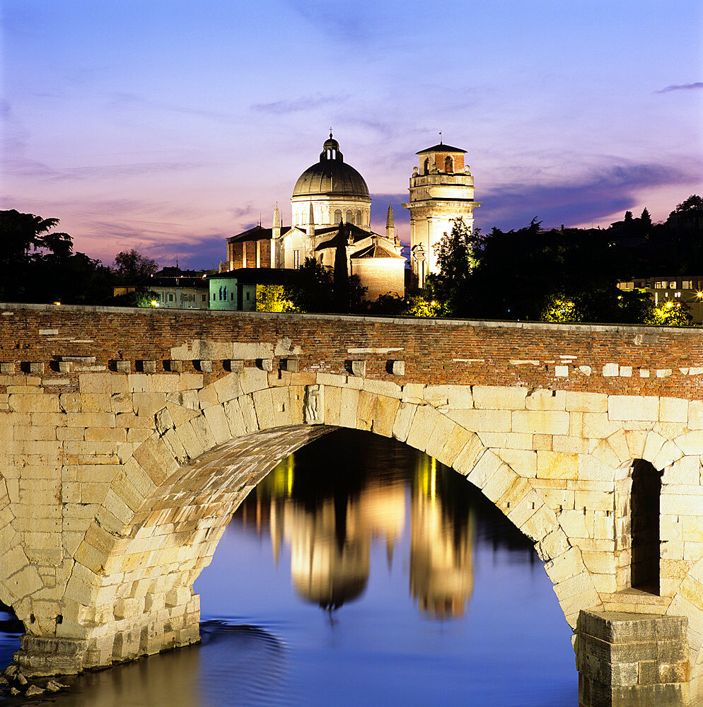 Ponte Pietra and the River Adige with San Giorgio in Braida at dusk, Verona, UNESCO World Heritage Site, Veneto, Italy, Europe