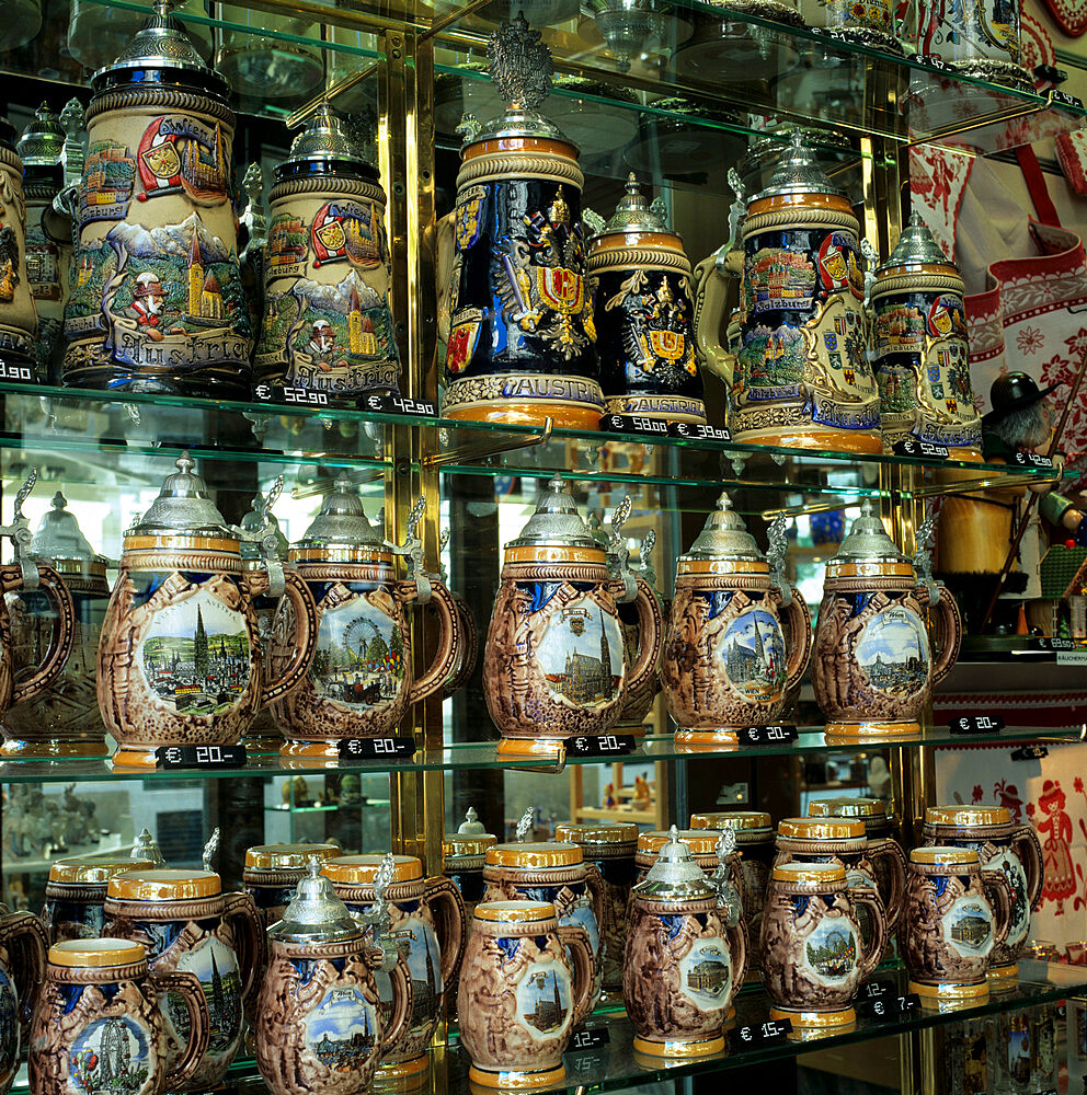 Souvenir shop window display of traditional Austrian beer tankards, Vienna, Austria, Europe