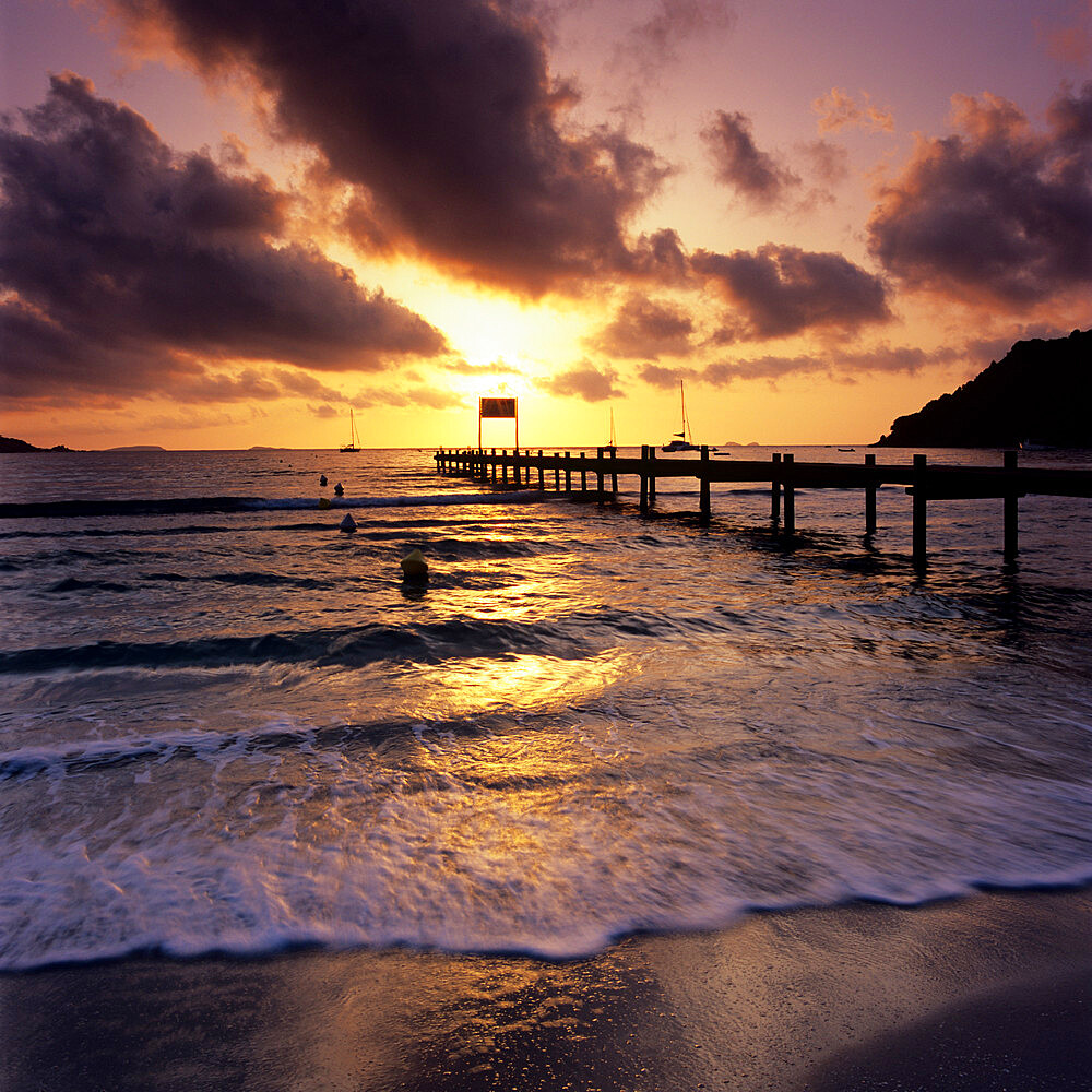 Pier at sunrise, Plage de Santa Giulia, South East Corsica, Corsica, France, Mediterranean, Europe