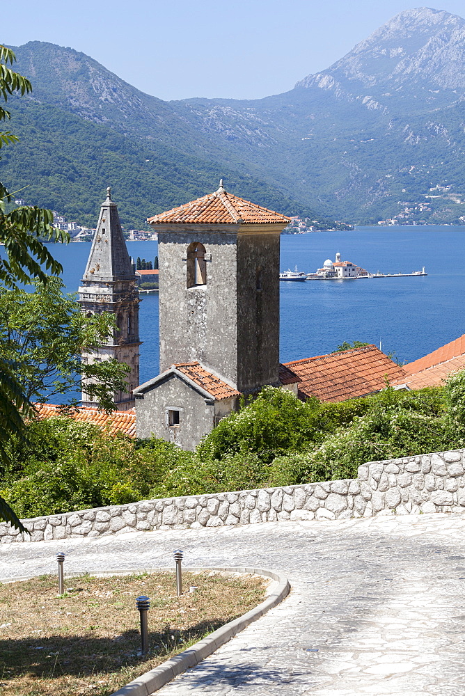 St. Nicholas Church and St. George's Island in the background, Perast, Bay of Kotor, UNESCO World Heritage Site, Montenegro, Europe