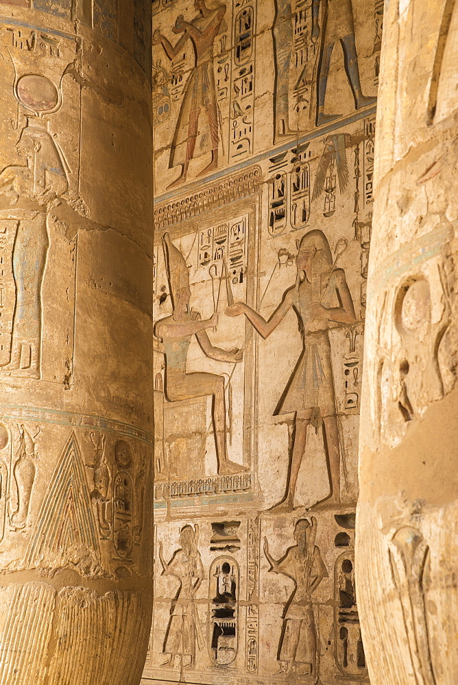 Columns in the portico of the Second Court, Temple of Ramesses III at Medinet Habu, West Bank, UNESCO World Heritage Site, Luxor, Egypt, North Africa, Africa