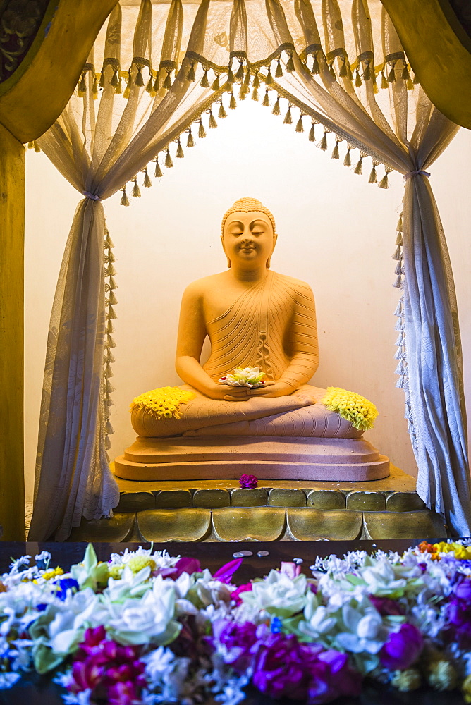 Temple of the Sacred Tooth Relic (Sri Dalada Maligawa), Buddha statue in a lotus position, Kandy, Sri Lanka, Asia