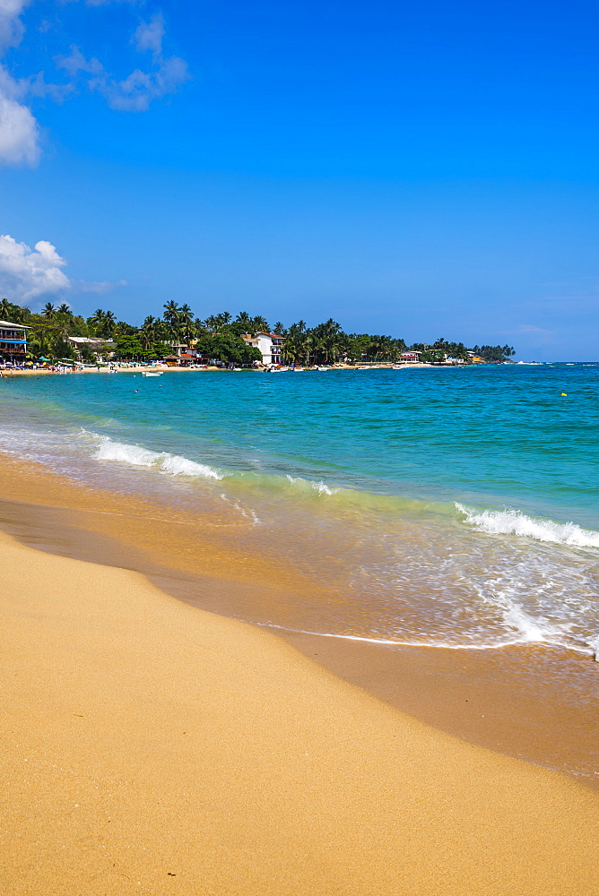 Unawatuna Beach, a beautiful sandy beach on the South Coast of Sri Lanka, Asia