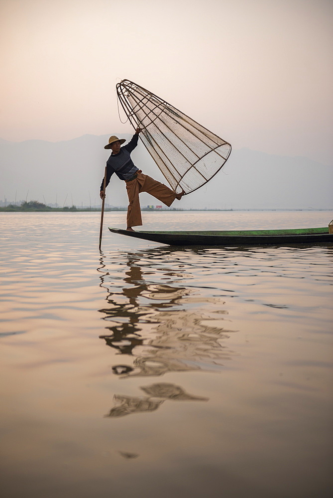 Inle Lake fisherman at sunrise (Intha fisherman), near Nyaungshwe, Shan State, Myanmar (Burma), Asia