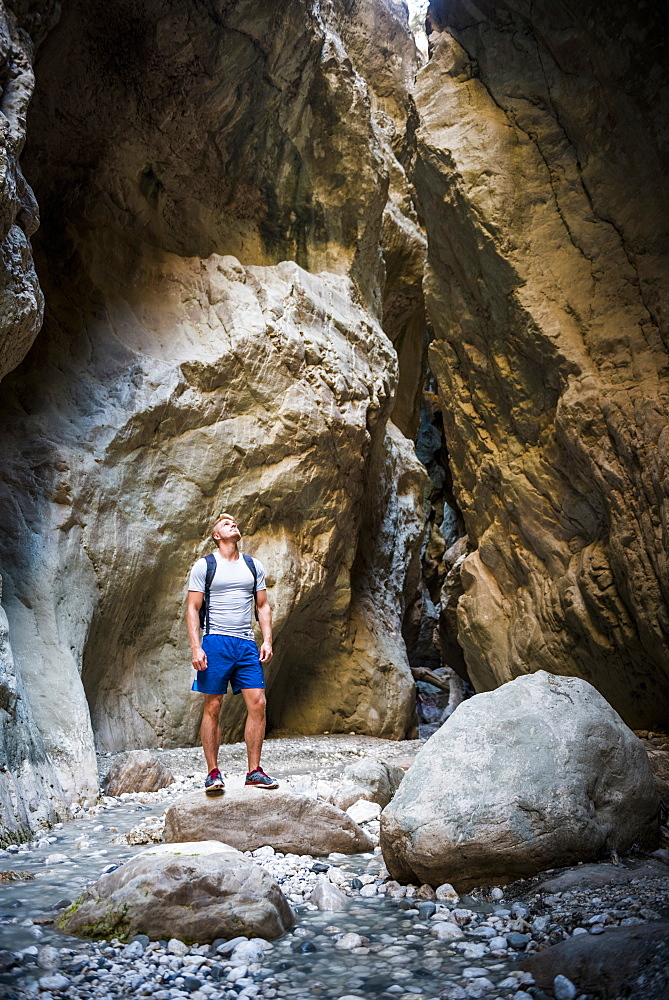 Tourist hiking in Saklikent Gorge, Saklikent National Park, Fethiye Province, Lycia, Anatolia, Turkey, Asia Minor, Eurasia