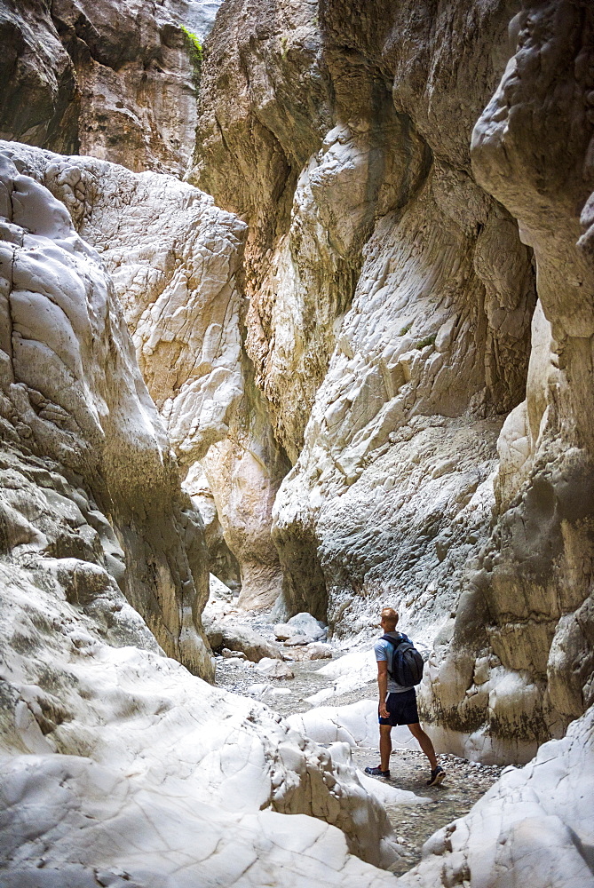 Tourist hiking in Saklikent Gorge, Saklikent National Park, Fethiye Province, Lycia, Anatolia, Turkey, Asia Minor, Eurasia