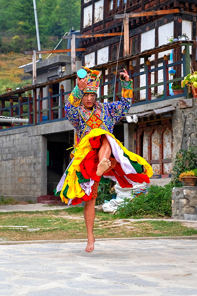 Bhutanese people performing the masked Cham Dance, Paro, Bhutan, Asia