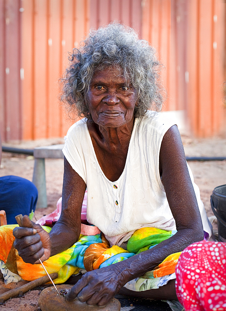 Portrait of a woman, an Aboriginal elder, at Nyinyikay Homeland, East Arnhem Land, Northern Territory, Australia, Pacific