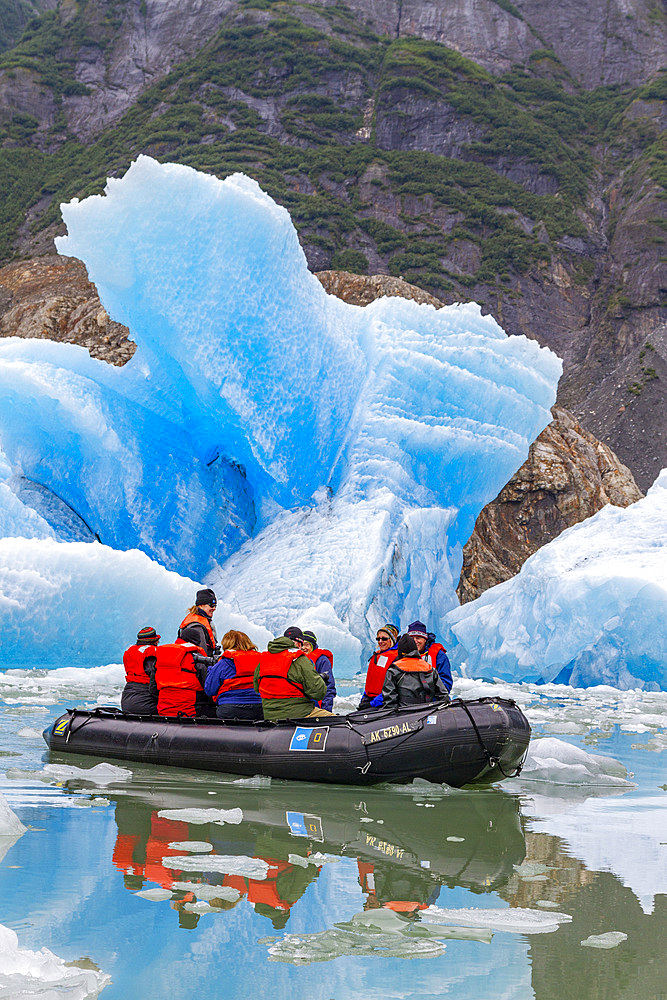 Guests from the Lindblad Expeditions ship National Geographic Sea Bird during Zodiac operations in Tracy Arm, Southeast Alaska, USA.