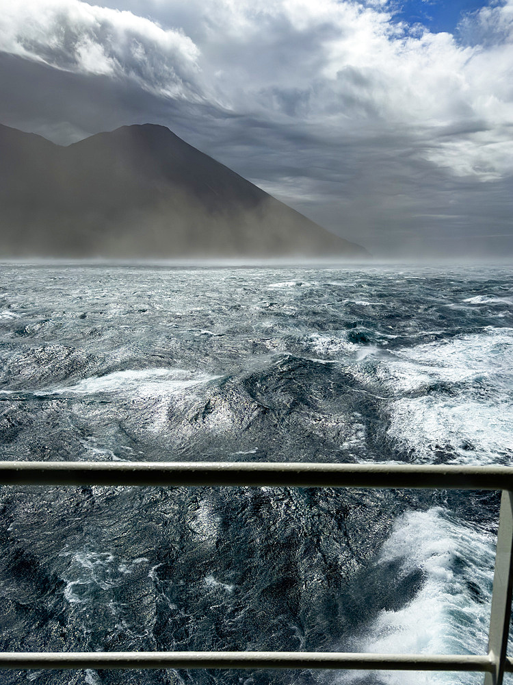 Gale force winds buffet the National Geographic Resolution in Tanaga Bay, Tanaga Island, Aleutian Islands, Alaska.