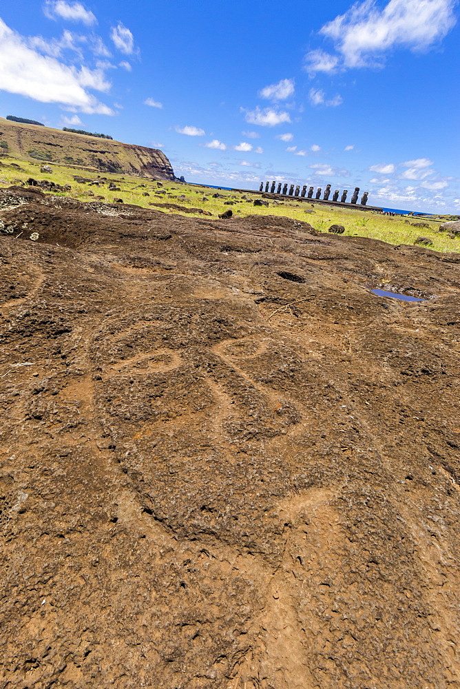 Petroglyphs carved in the lava at the 15 moai restored ceremonial site of Ahu Tongariki on Easter Island (Isla de Pascua) (Rapa Nui), UNESCO World Heritage Site, Chile, South America