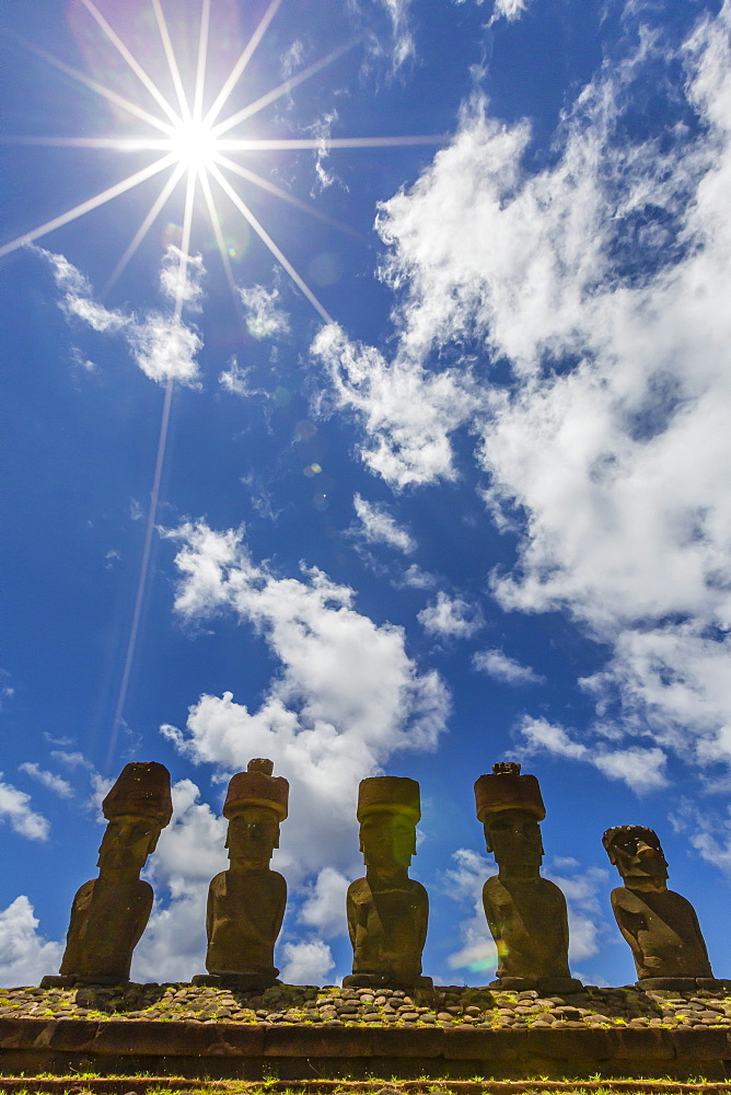 Moai with scoria red topknots at the restored ceremonial site of Ahu Nau Nau on Easter Island (Isla de Pascua) (Rapa Nui), UNESCO World Heritage Site, Chile, South America