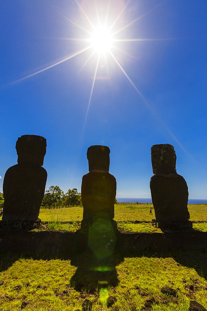 Detail of moai looking into the sun at Ahu Akivi, the first restored altar on Easter Island (Isla de Pascua) (Rapa Nui), UNESCO World Heritage Site, Chile, South America