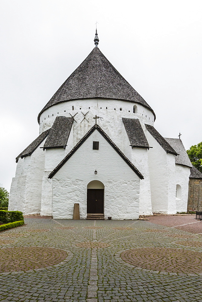 Exterior view of the 13th century circular design Osterlars Church, Bornholm, Denmark, Scandinavia, Europe