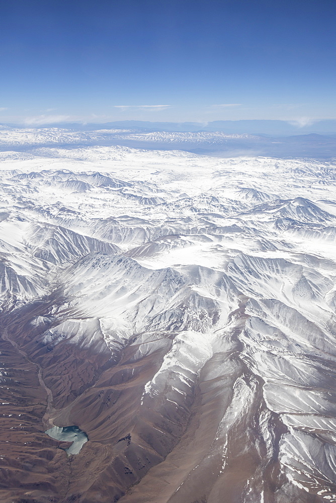 Aerial view of the snow-capped Andes Mountain Range, Chile, South America