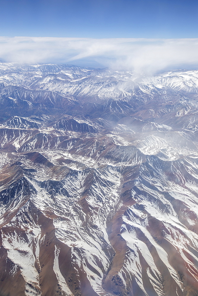 Aerial view of the snow-capped Andes Mountain Range, Chile, South America