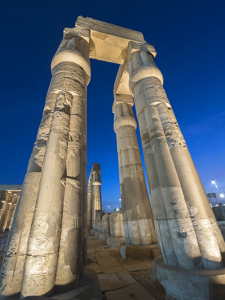 The Luxor Temple at night, a large Ancient Egyptian temple complex constructed approximately 1400 BCE, UNESCO World Heritage Site, Luxor, Thebes, Egypt, North Africa, Africa