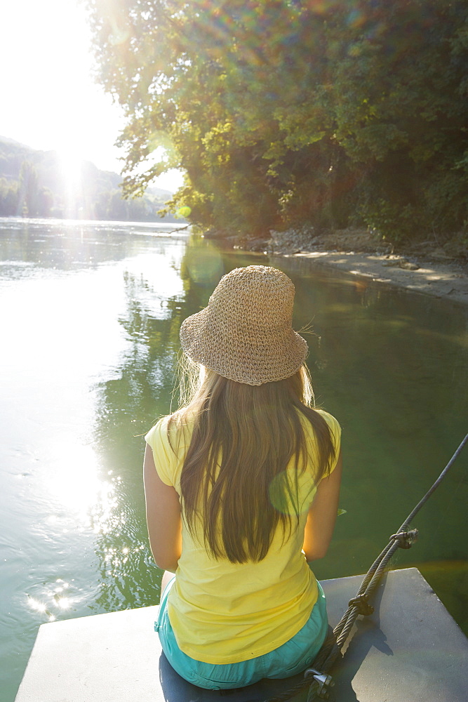 Teenage girl at river Rhine, Rheinfelden, Baden-Wuerttemberg, Germany