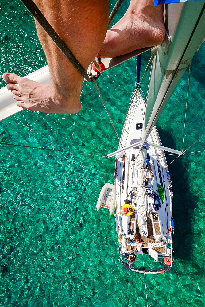 view from the masthead of an anchoring sailing yacht in a lonely bay on a greek island, Aegean, Cyclades, Greece