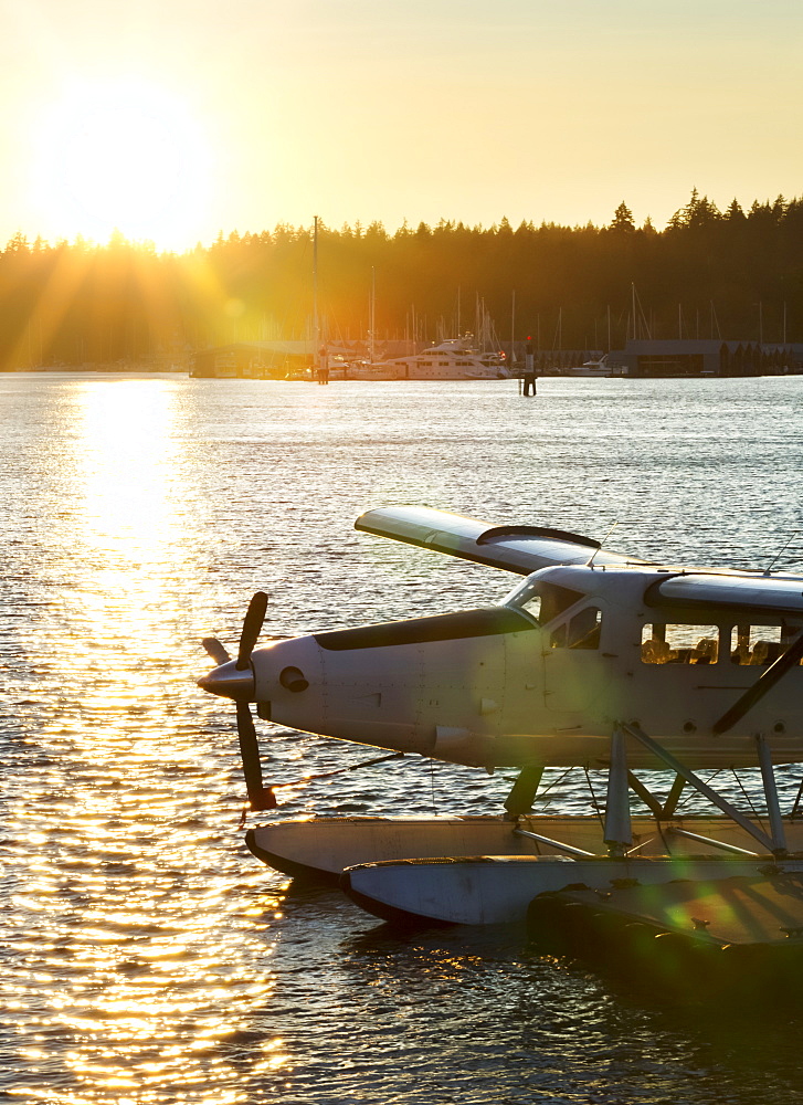 Floatplane along a dock a sunset, Vancouver, British Columbia, Canada