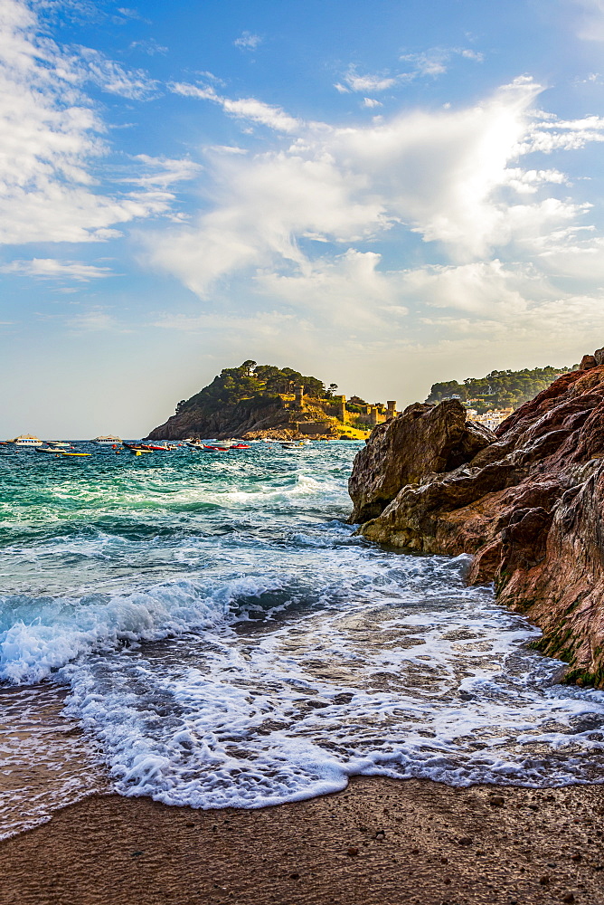 Beach view from Tossa de Mar of Castell de Tossa, which was built in 1187, Tossa de Mar, Girona, Spain