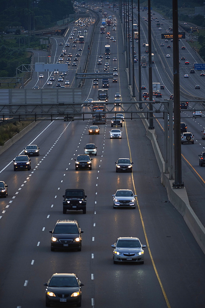 Highway 401 looking West towards Yonge Street at dusk, Toronto, Ontario, Canada