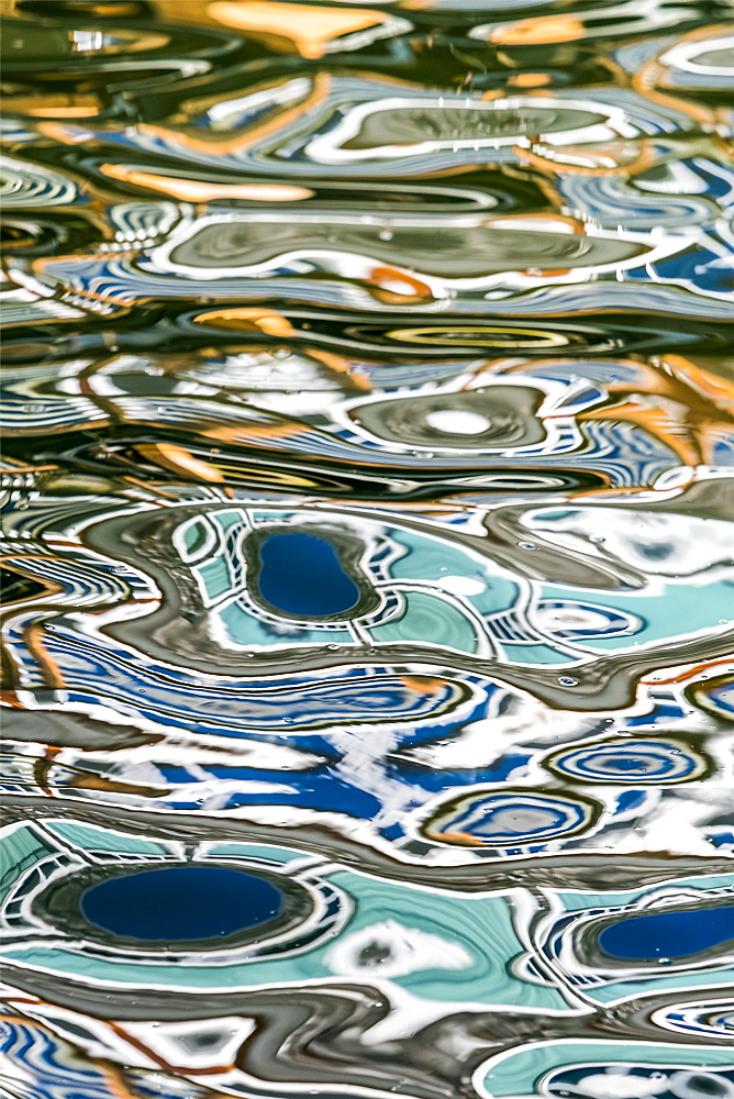 A popular restaurant is reflected on the Columbia River, Astoria, Oregon, United States of America