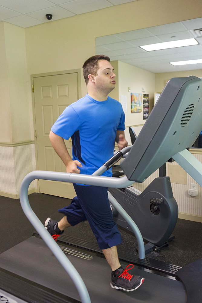 Man with Down Syndrome running on treadmill