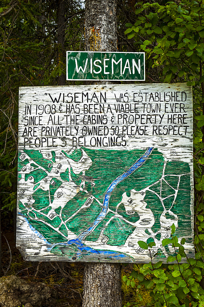 Wiseman entrance signage with hand written message and map, Arctic Alaska; Wiseman, Alaska, United States of America