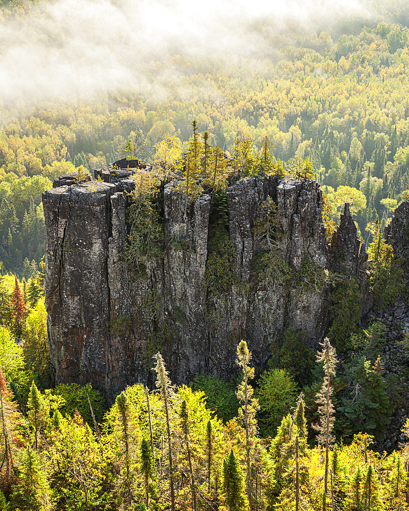 Sunrise over a misty, foggy valley in the Canadian Shield; Dorian, Ontario, Canada