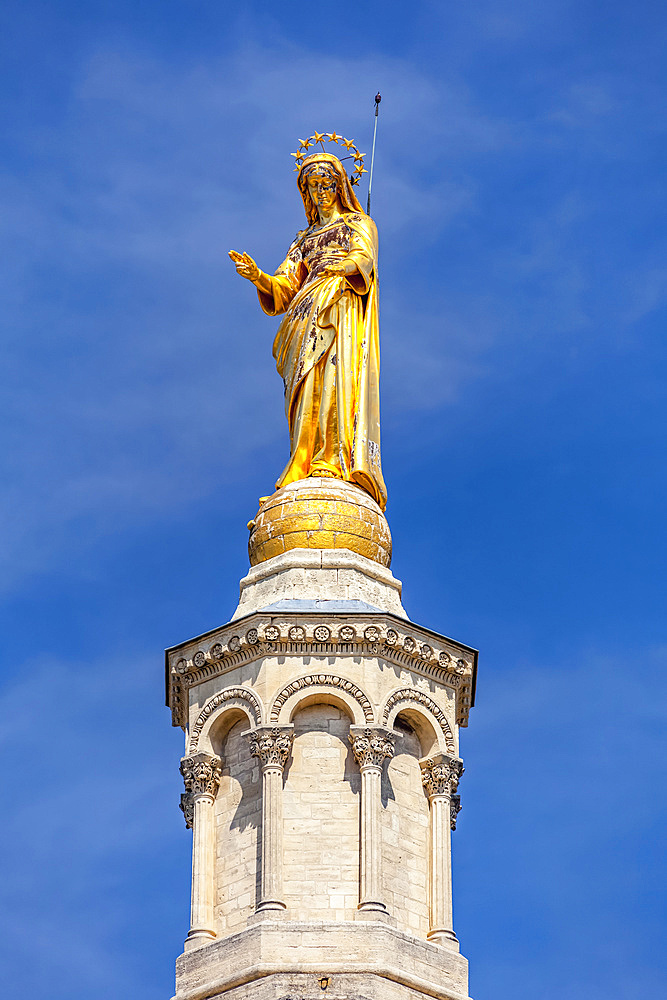 Golden statue of the Virgin Mary at Avignon Cathedral by the Palais des Papes; Avignon, France