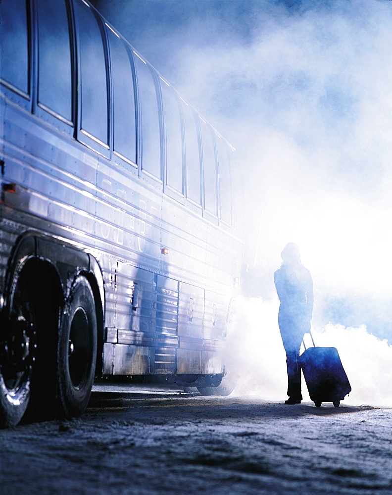 Woman Getting On Bus In Winter