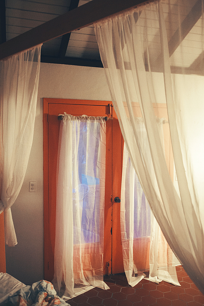 Drapery in a quaint guest room on a Caribbean island, Virgin Gorda, British Virgin Islands