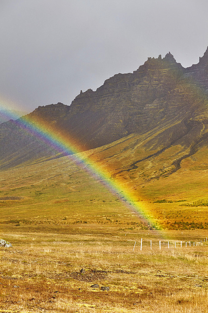 Rainbow stretches across a valley on the Snaefellsnes peninsula, on the west coast of Iceland, Iceland