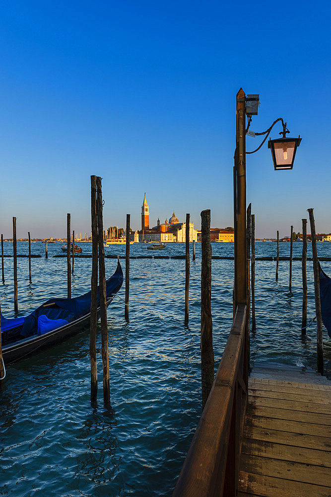 Gondolas at Saint Mark's Square with view of San Giorgio Maggiore island in Venice, Venice, Veneto, Italy