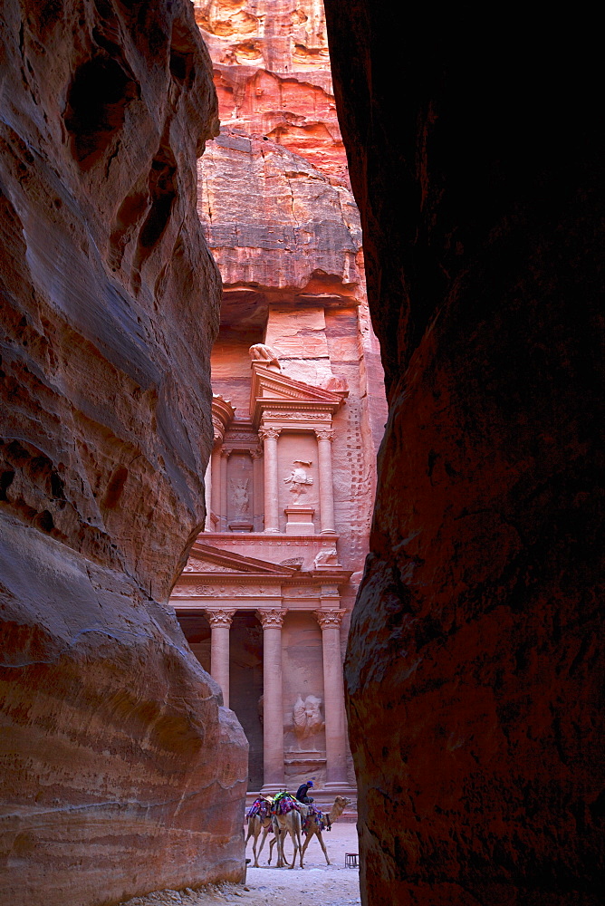 Glimpse of the Treasury from the Siq, Petra, UNESCO World Heritage Site, Jordan, Middle East