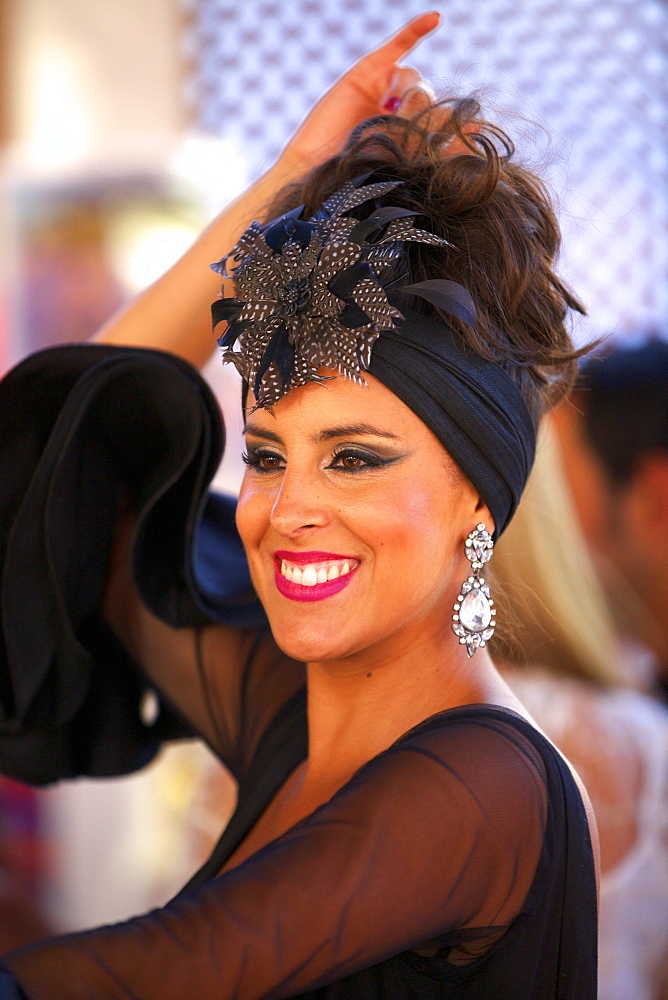 Flamenco dancer in traditional dress, Annual Horse Fair, Jerez de la Frontera, Cadiz Province, Andalusia, Spain, Europe