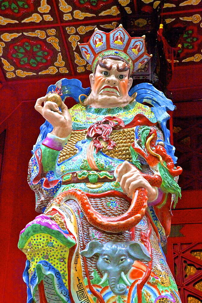 Statue of Virupaksa, one of The Four Heavenly Kings at Wong Tai Sin Temple, Hong Kong, China, South East Asia