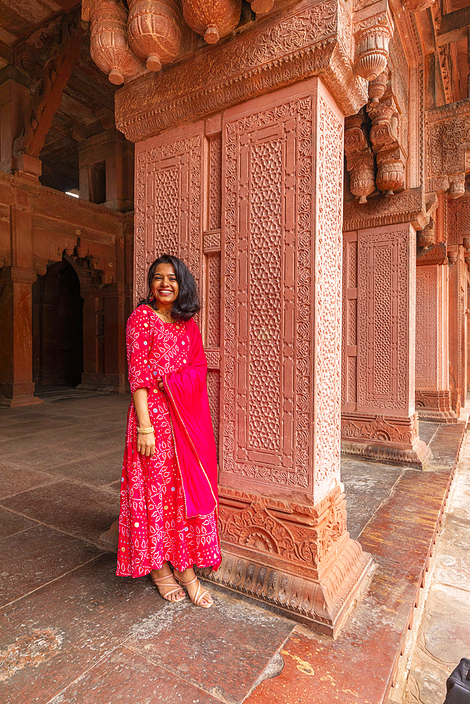 Young Indian woman in the Agra Fort (Red Fort), UNESCO World Heritage Site, Agra, Uttar Pradesh, India, South Asia, Asia