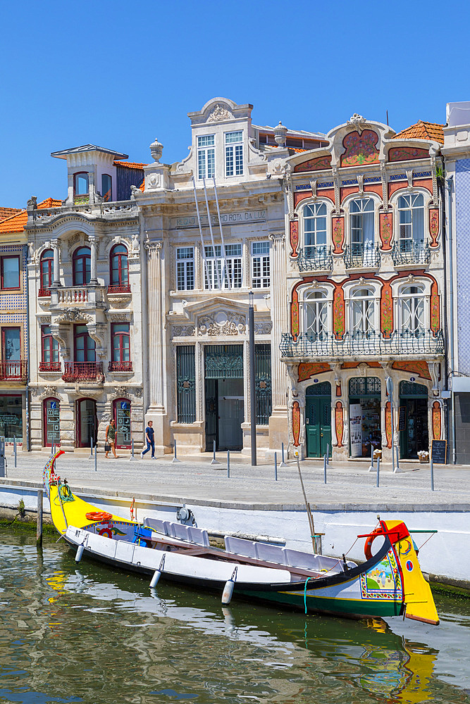 A Moliceiro with Traditional Art Nouveau architecture, Aveiro, Centro, Portugal, Europe