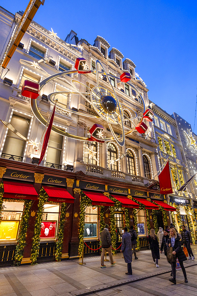 Cartier London New Bond Street Shop with Christmas Decorations at dusk, London, England, United Kingdom