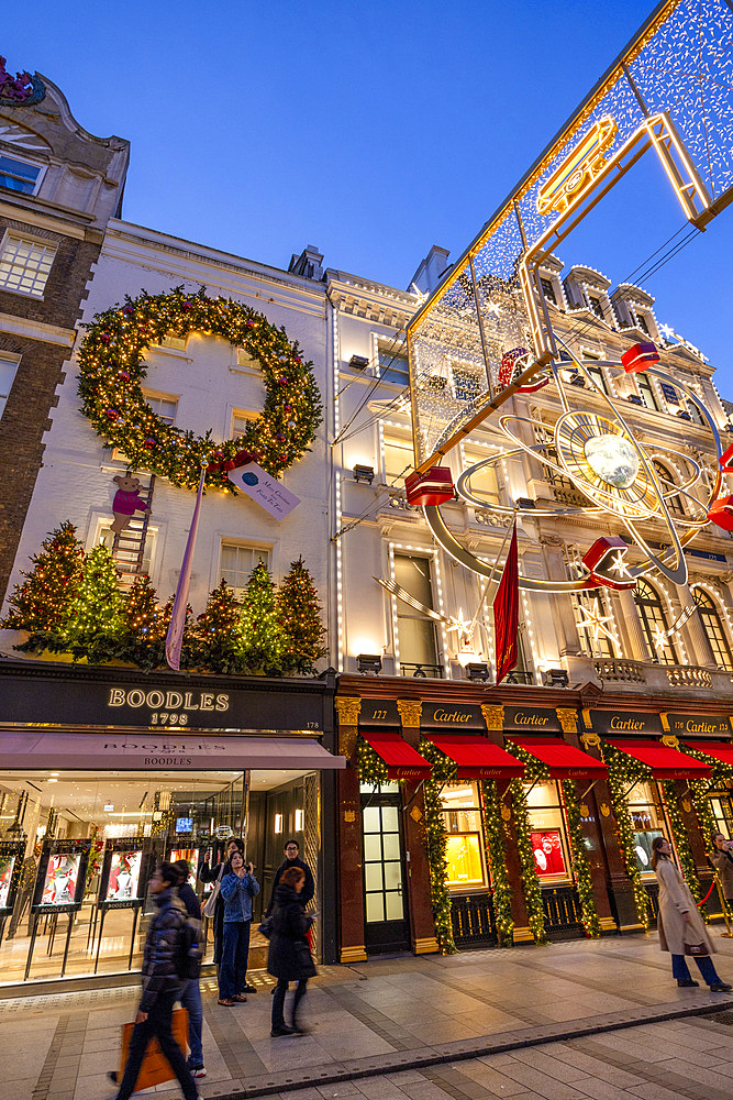 Cartier London New Bond Street Shop with Christmas Decorations at dusk, London, England, United Kingdom